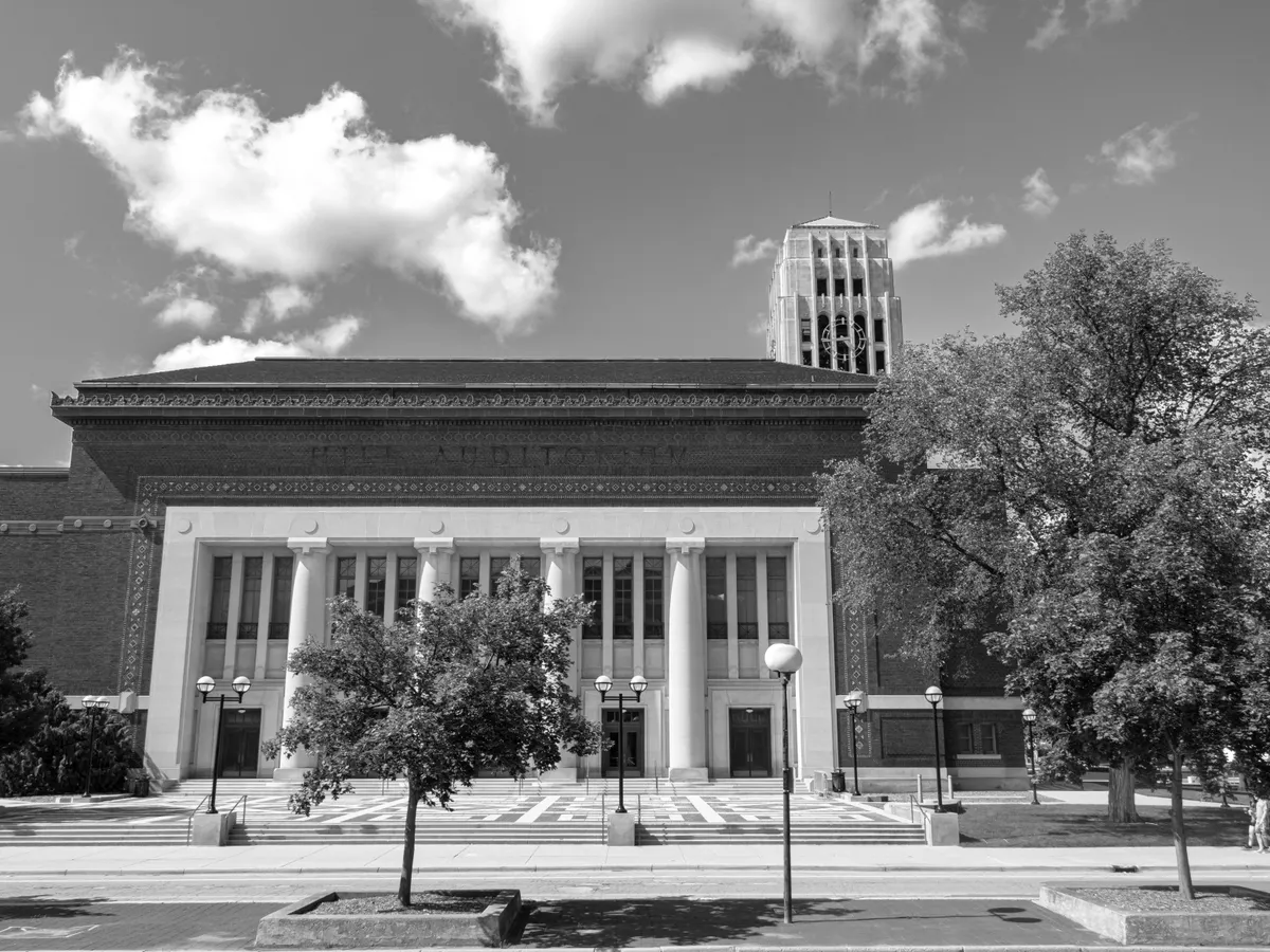 Black and white photo of the facade of Hill Auditorium in Ann Arbor